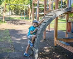 Smiling boy sunny playground