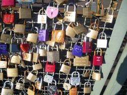 variety of castles on the bridge as a symbol of love