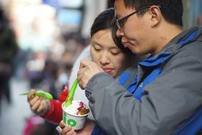 Loving couple eating ice cream shanghai