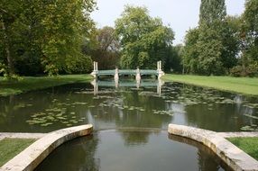 pond in the park of the Chateau de Chantilly in France