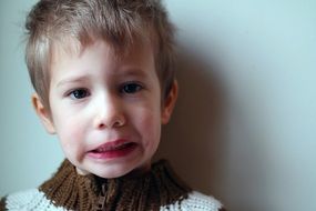 portrait of boy is hamming