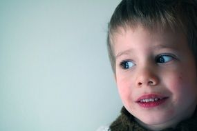 Photo of surprised boy closeup