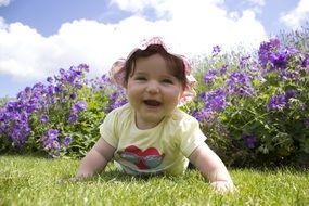 baby in the flower field