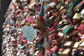 love locks with inscriptions on the bridge