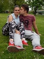 couple in love on green grass in spring