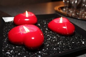 three red heart form candles, romantic decoration