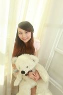 cute smiling girl with teddy bear