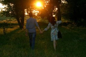 happy couple in the summer forest