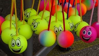 colorful balls with smiley face