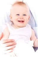 happy child in dad's hands