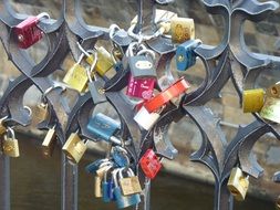 friendship locks on a metal fence