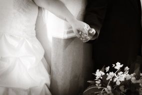 retro photo of newlyweds holding hands