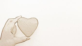 drawing of a left hand with a heart