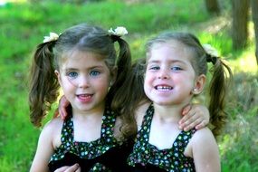 twins in identical dresses