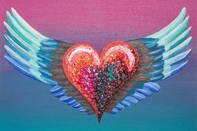 heart with wings on a colorful background