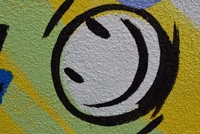 white smiley on the wall