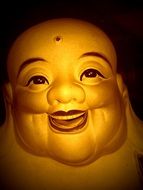 happy smiling buddha face