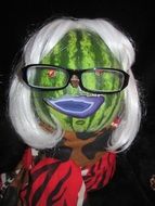 character with a face like a watermelon