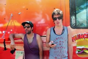 guys in glasses on the background of the truck