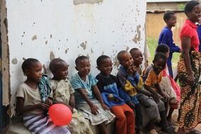 African children sit on the bench