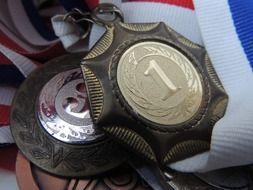 Win medal