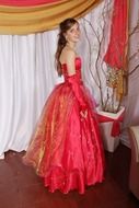 beautiful young girl in coral elegance dress