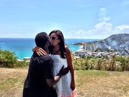 kissing couple in love on sea coast