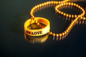 ring and necklace lie on the table