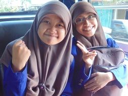 happy laughing islamic girls