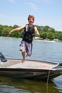 jump through the boat on a sunny day