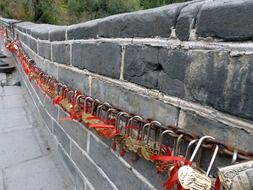 metal locks of lovers along the wall in China