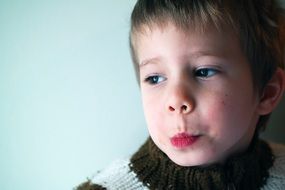 photo portrait of a pensive boy