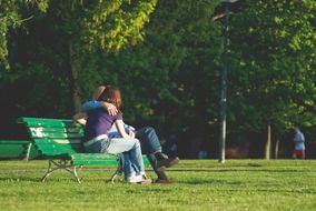 couple kissing in the park