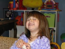 laughing girl in the children's room