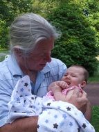 loving grandfather with baby girl