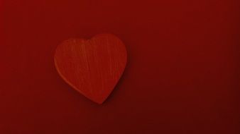 red heart on a red background