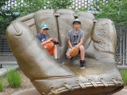 american guys on a baseball glove sculpture