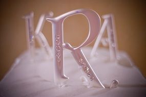 wedding cake with letters close up