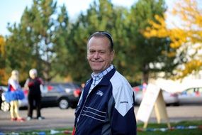 Smiling man elderly standing outdoor