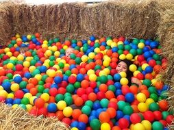 Children play in the colorful balls