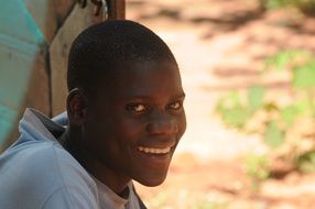 smiling young man in Guinea