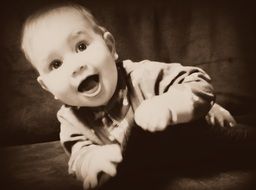 laughing baby, sepia