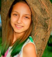 portrait of a girl on a background of wood