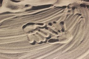 love handprints on the sand