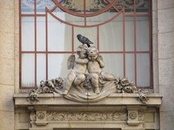 cupids statue on adolphus hotel, usa, dallas, texas