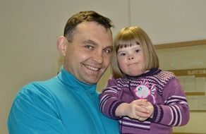 happy father with baby daughter