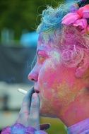 rainbow painted girl smoking