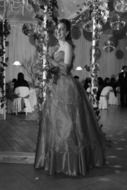 girl in a beautiful long dress in black and white background