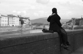 couple in love on the waterfront of florence