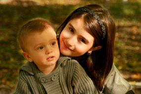 sister and brother outside